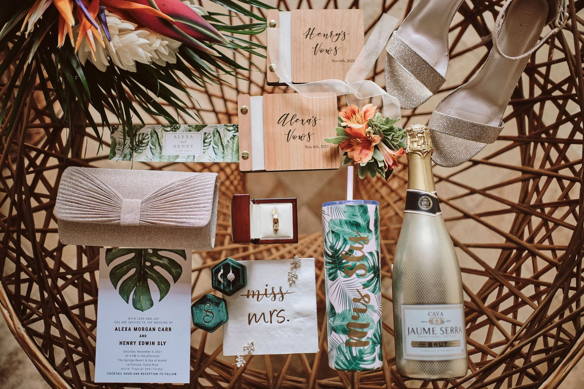 Romantic pastel tropical themed wedding with whimsical tropical details in a lush setting