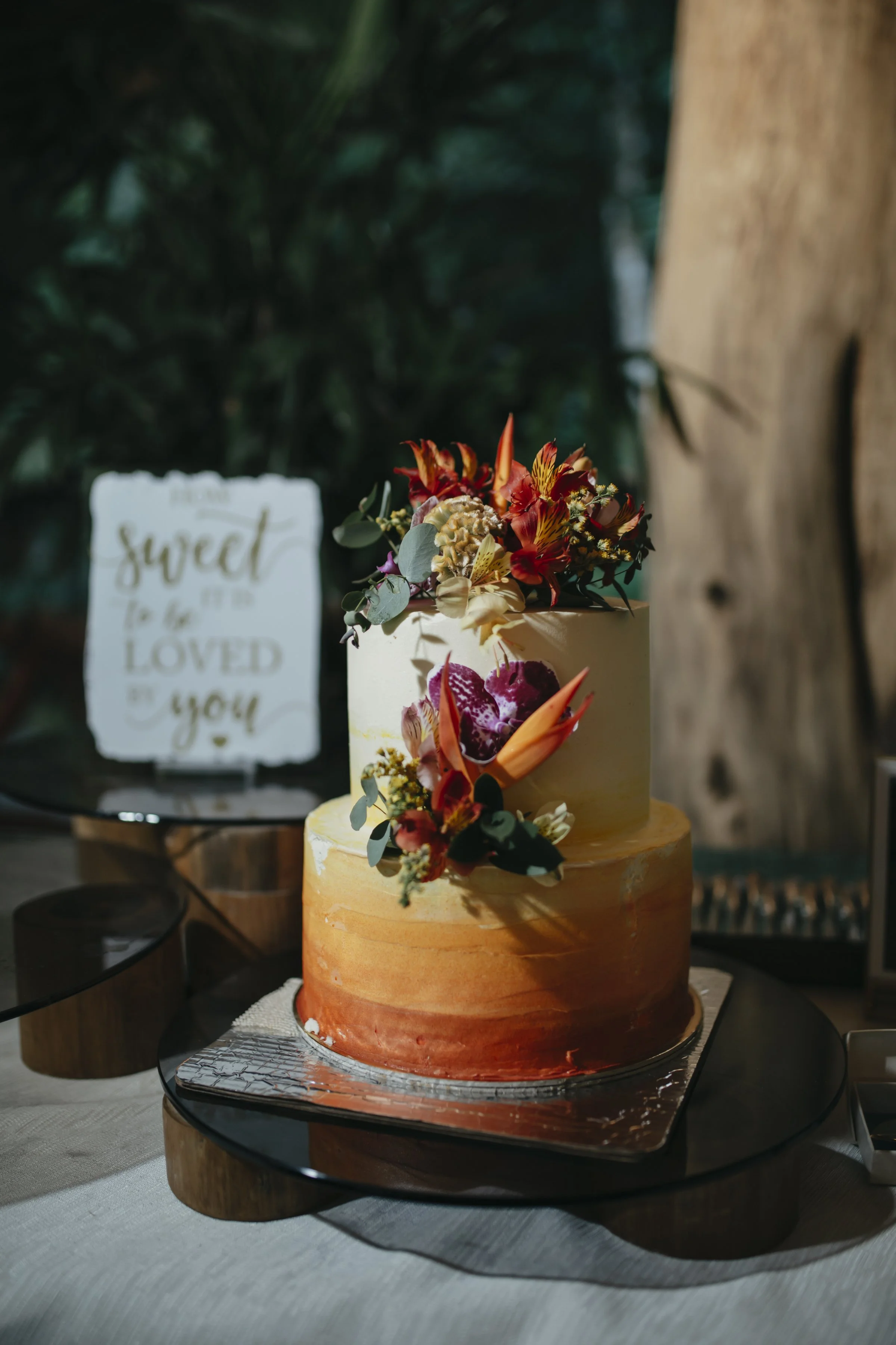 Tropical, colorful wedding cake with Arenal Volcano 