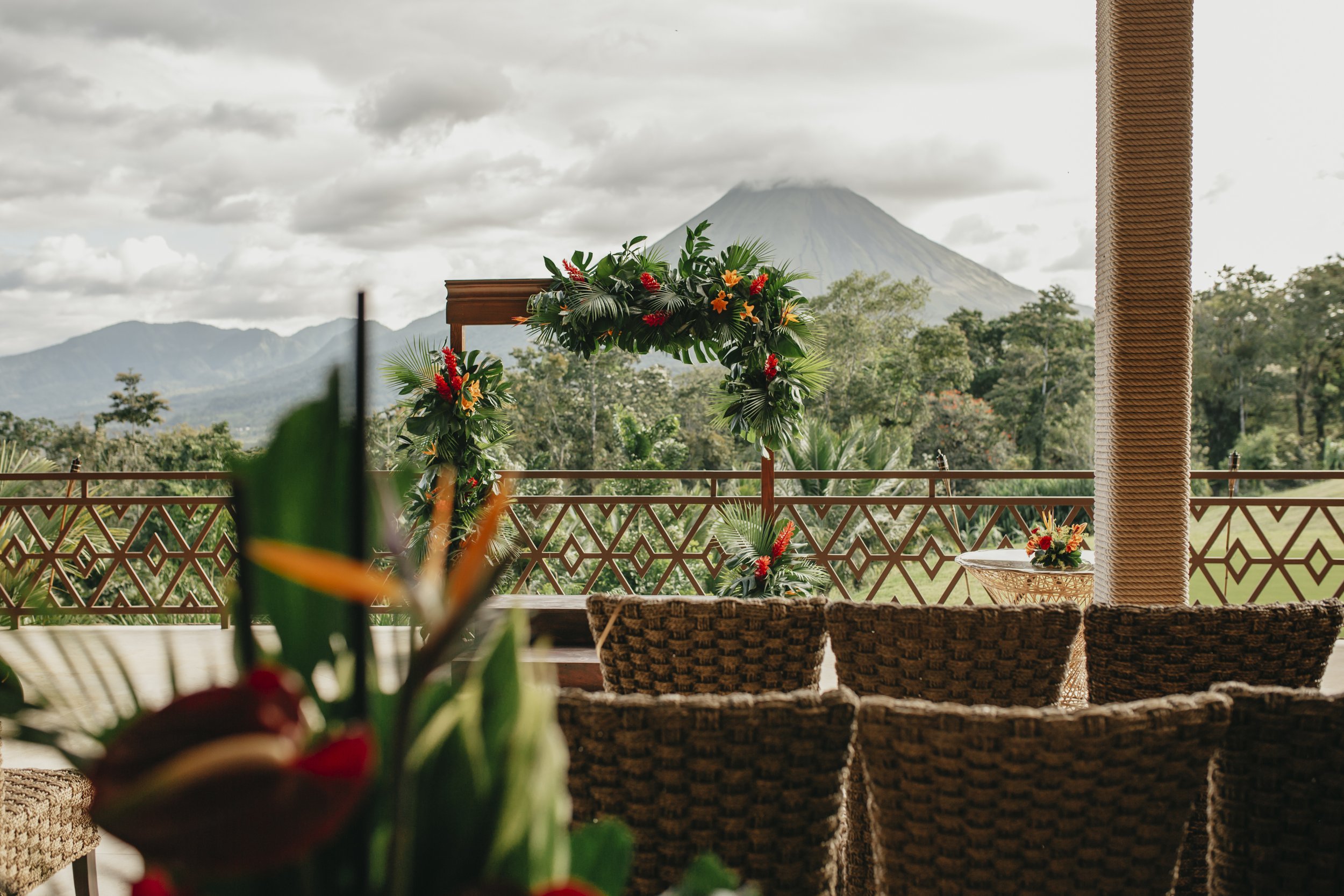 Vibrant, tropical wedding with colorful florals and Arenal Volcano’s breathtaking backdrop.