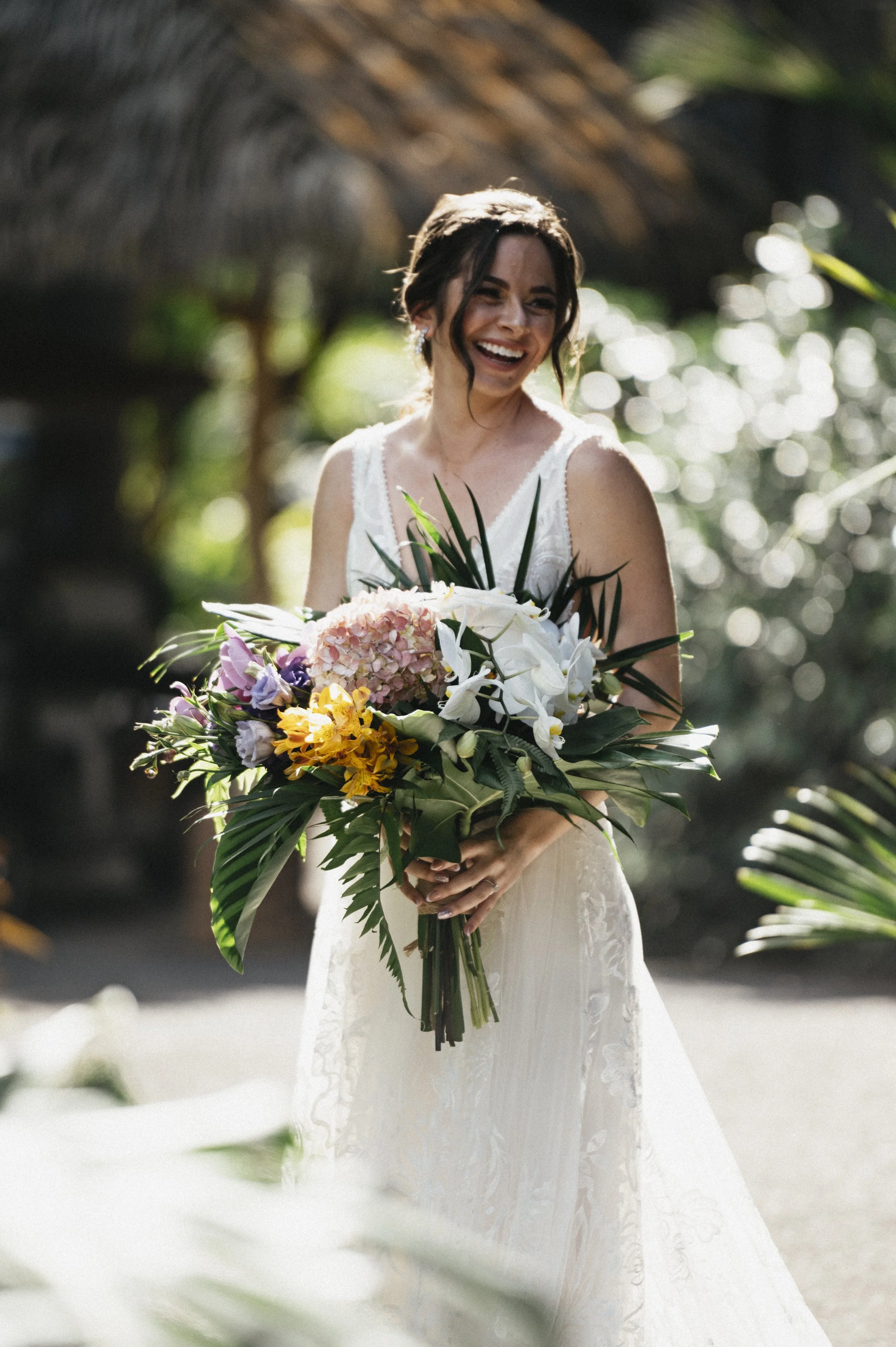 Bride arriving through the rainforest trails.
