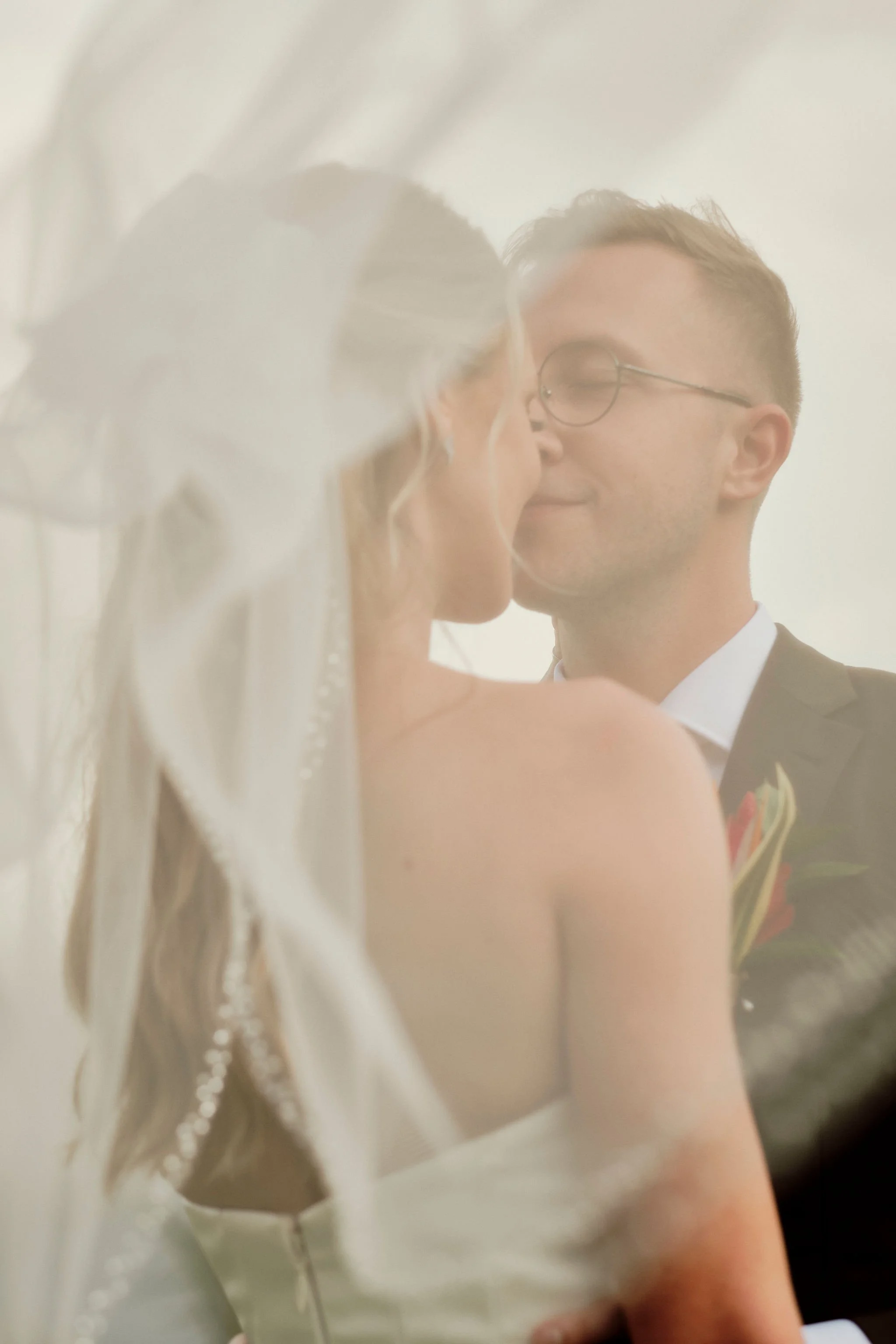 Romantic, adventurous wedding portrait 
surrounded by verdant forests and wild beauty.