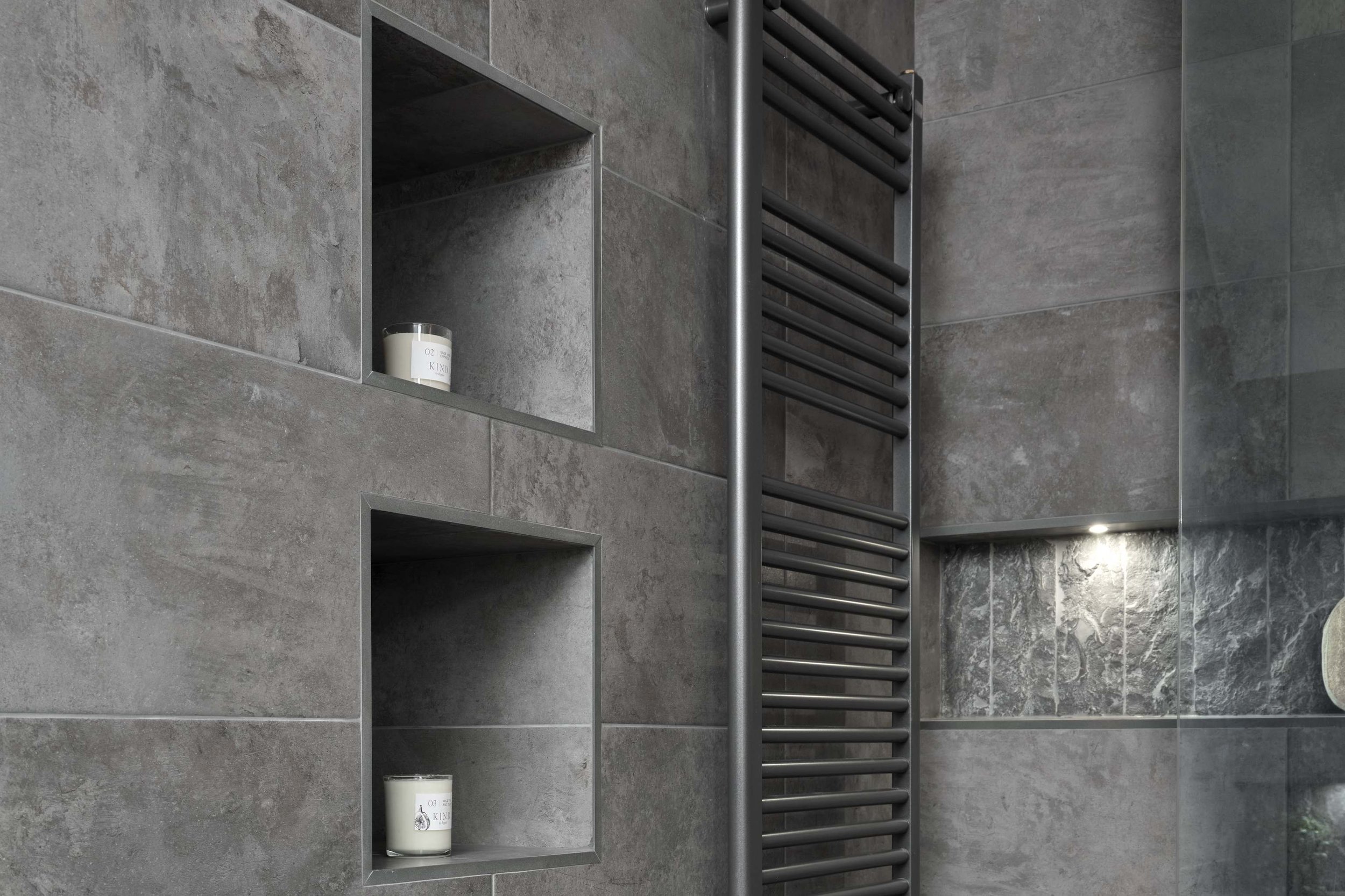grey-towel-rail-in-bathroom0with-storage-niches.jpg