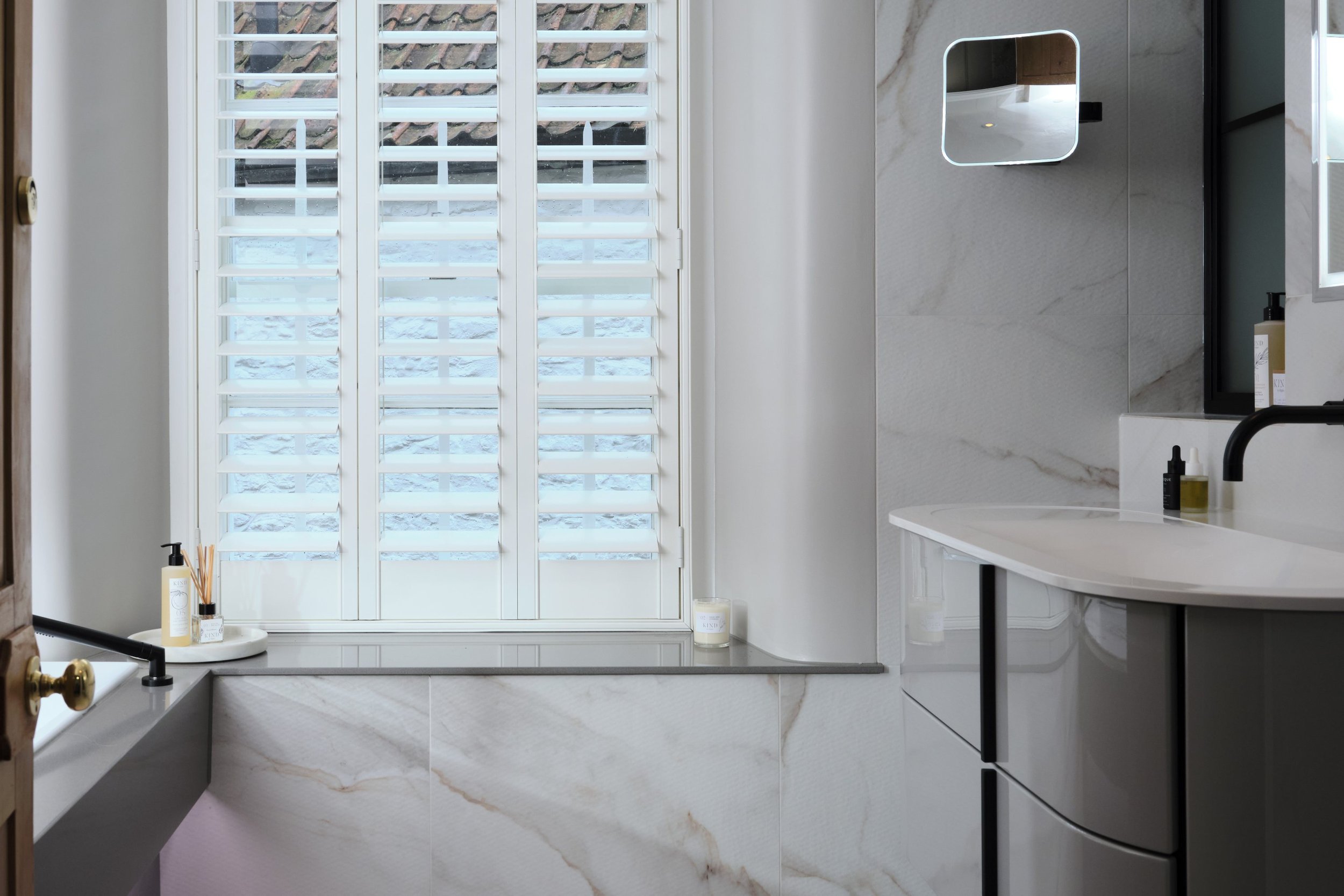 view-of-window-in-bathroom-with-marble-tiles.jpg