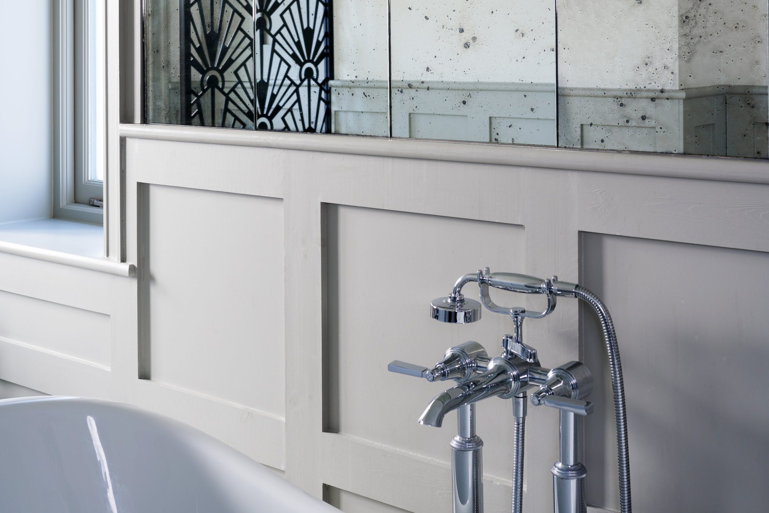 chrome-traditional-bath-tap-with-grey-panelling.jpg