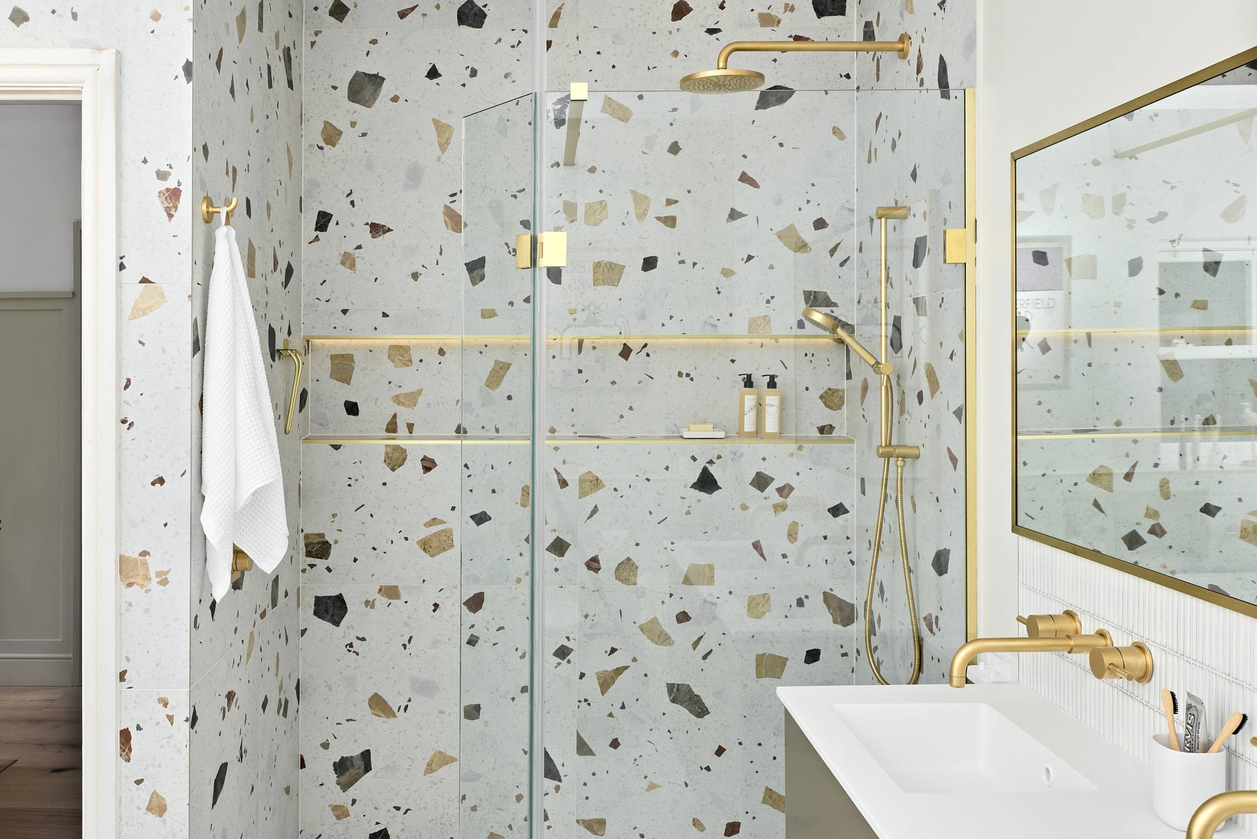 terrazzo-tiled-bathroom-with-brushed-gold-brassware.jpg