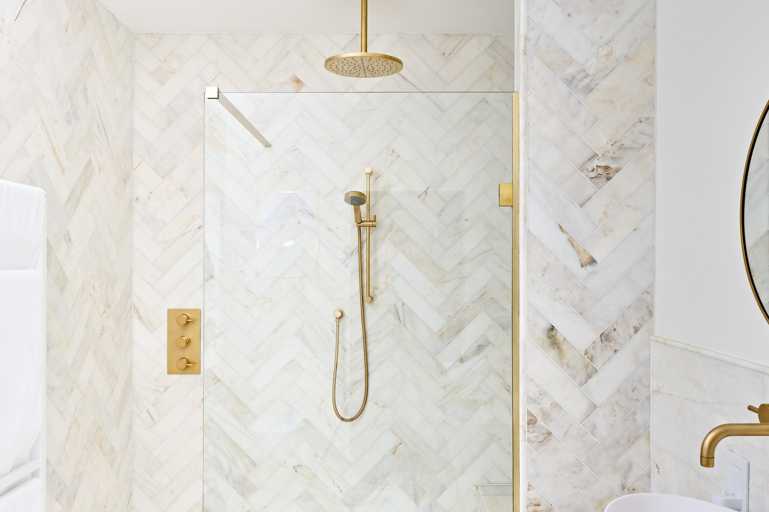 neutral-bathroom-with-satin-gold-shower.jpg
