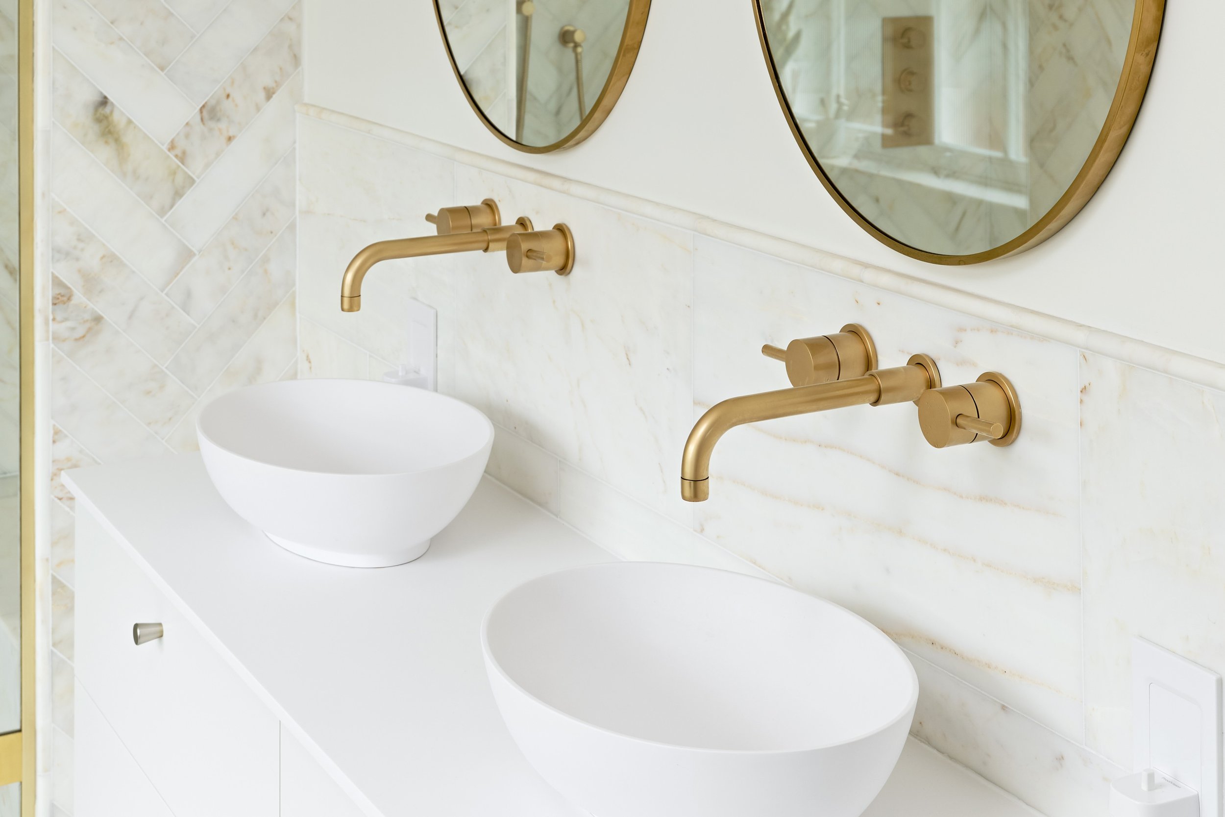 basins-in-neutral-bathroom-with-satin-gold-brassware.jpg