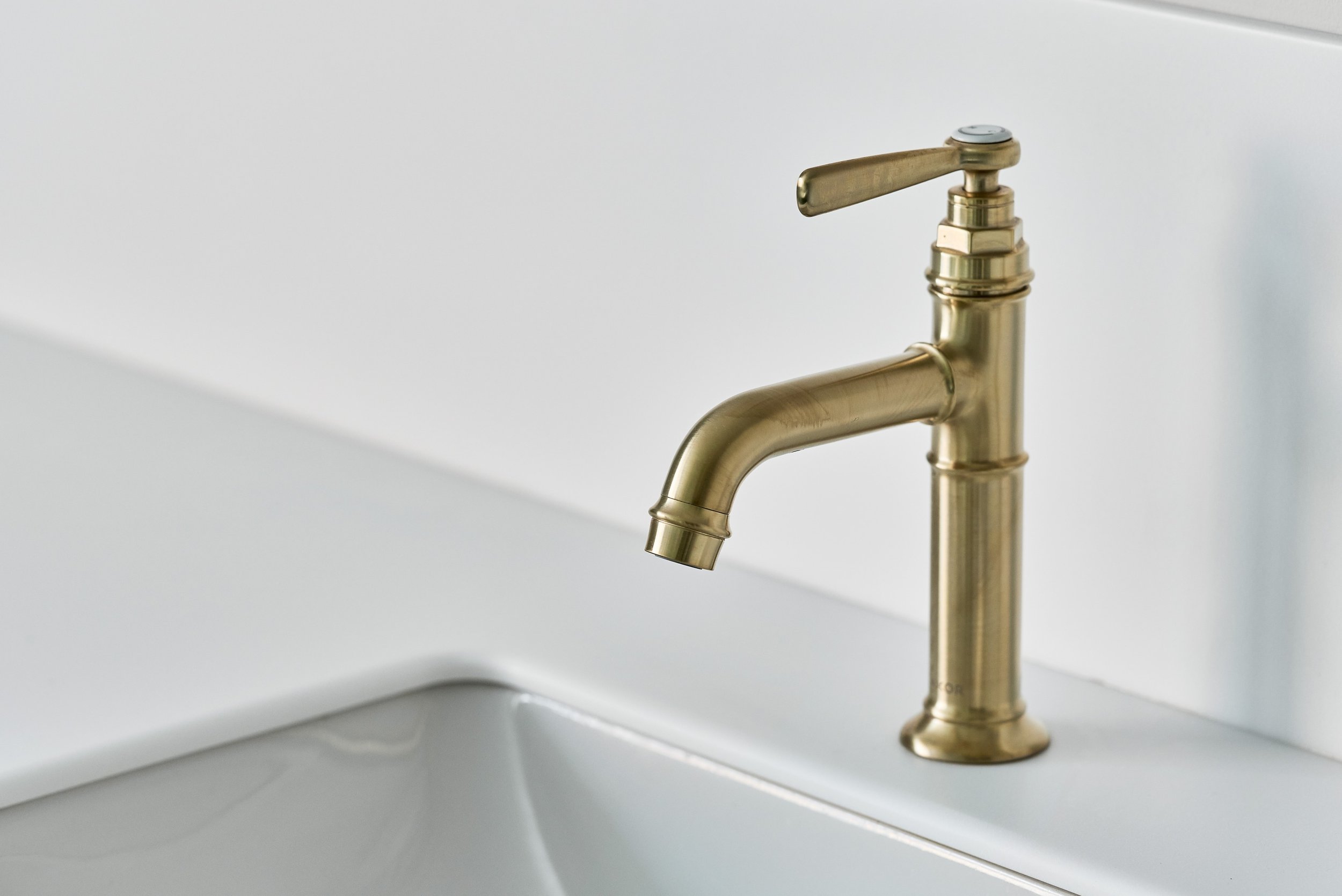 close-up-of-brushed-brass-basin-tap.jpg