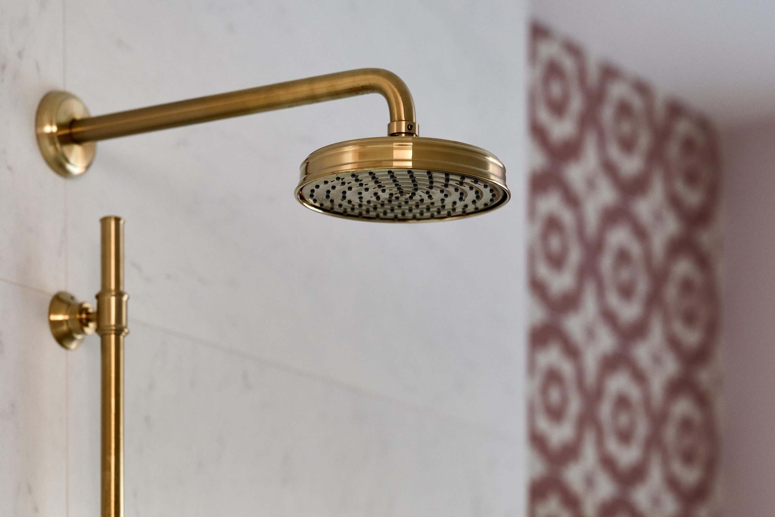 close-up-of-brass-shower-in-ripples-bathroom.jpg