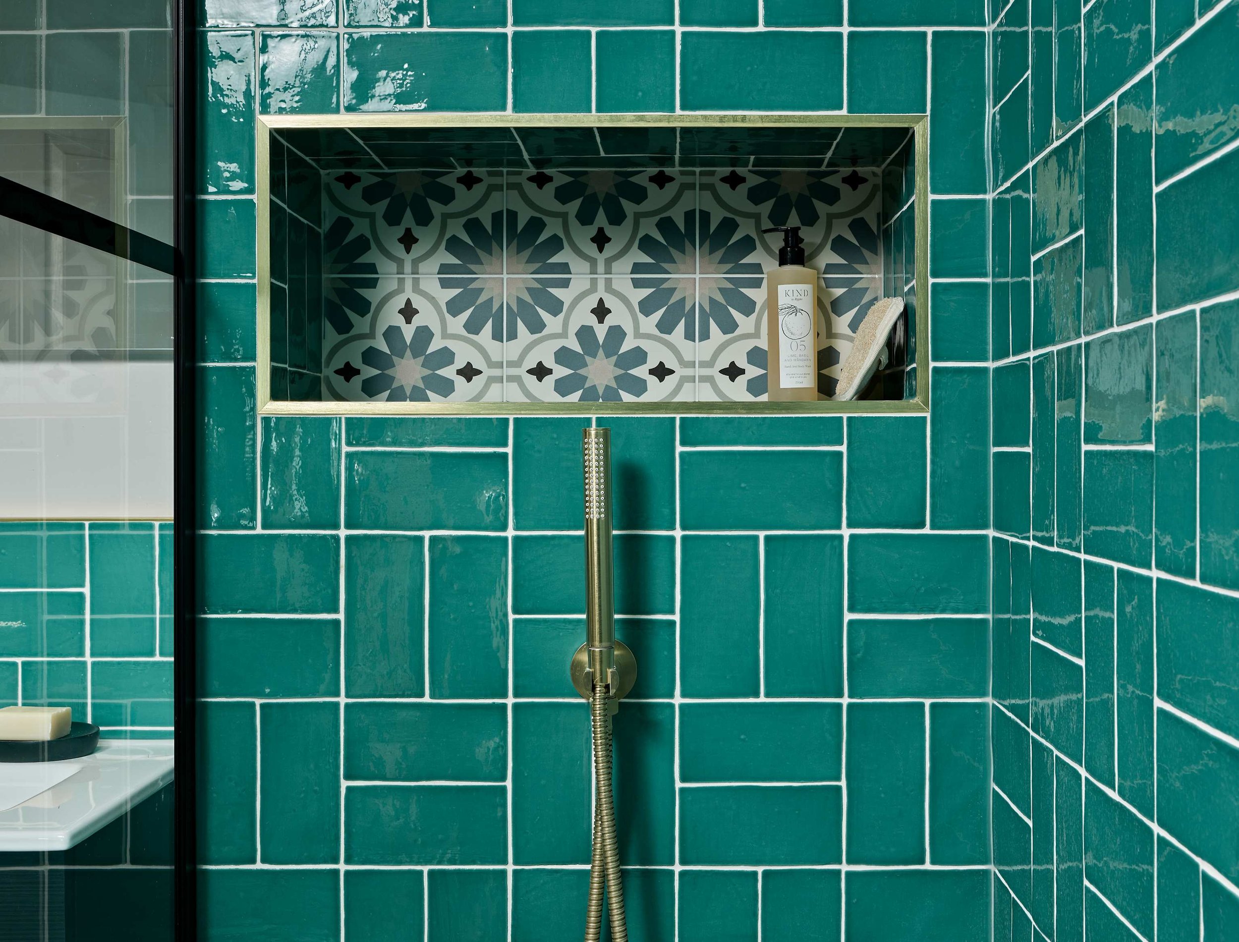 close-up-storage-niche-turquoise-bathroom.jpg