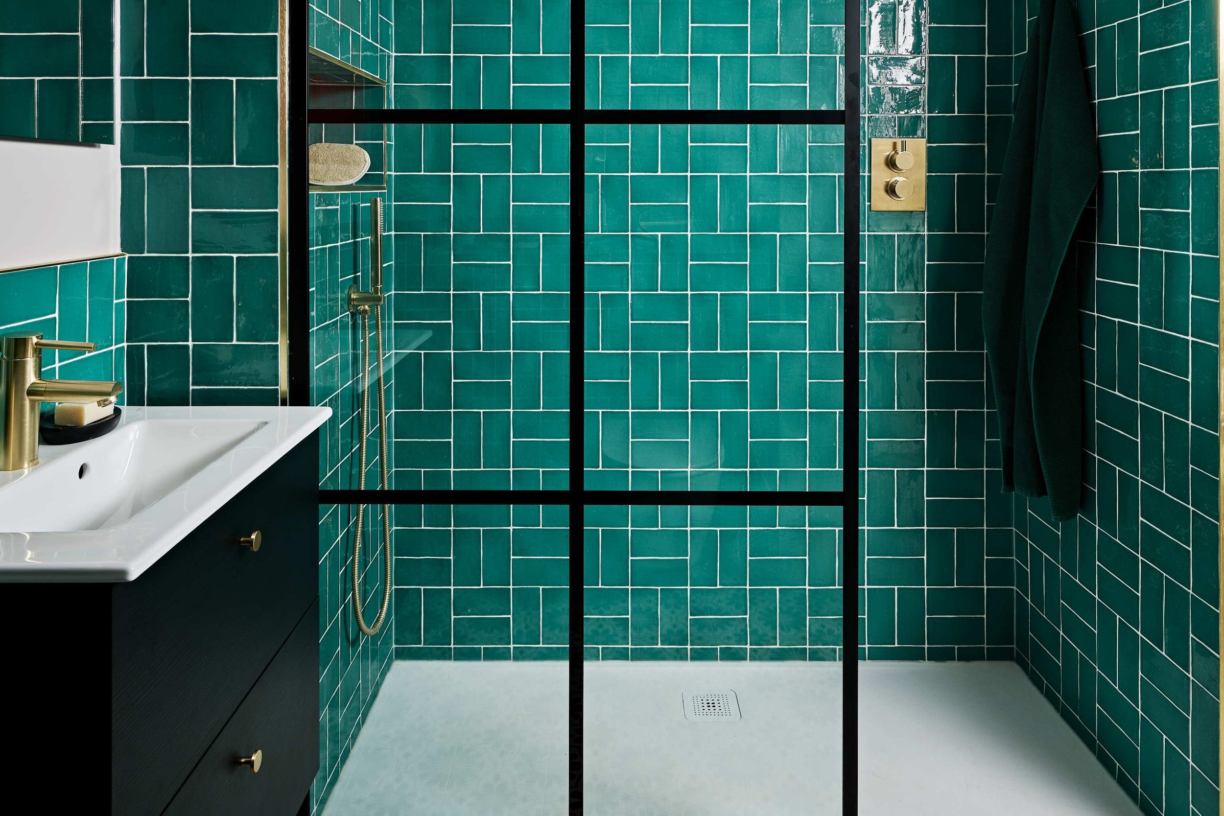 turquoise-shower-room-with-gold-brassware.jpg