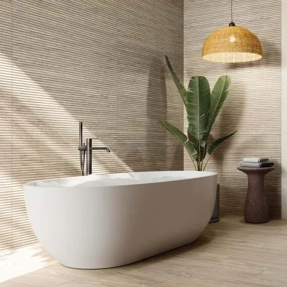 wooden effect fluted tile in bathroom with a bath in the middle.