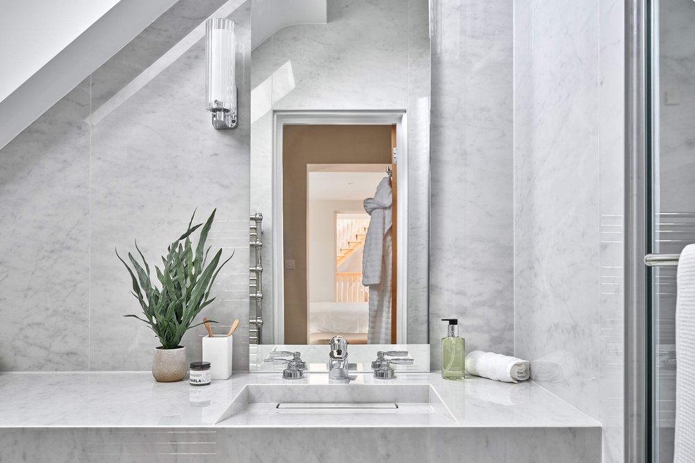 Bathroom Gallery: Hotel-inspired Guest En-suite With Sleek Floating ... - Suite Hotel Room With En-Suite Bathroom