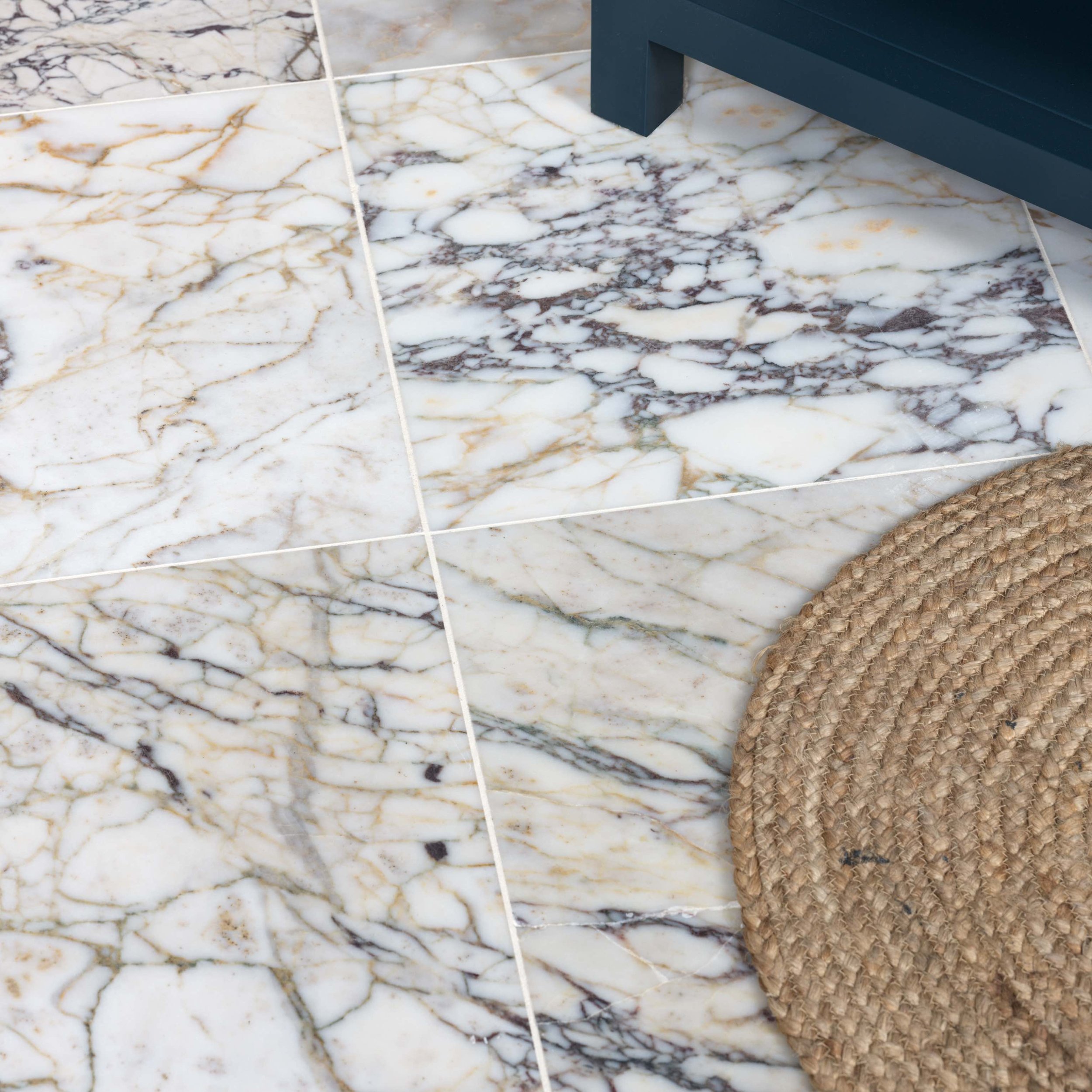 white veined marble tile
