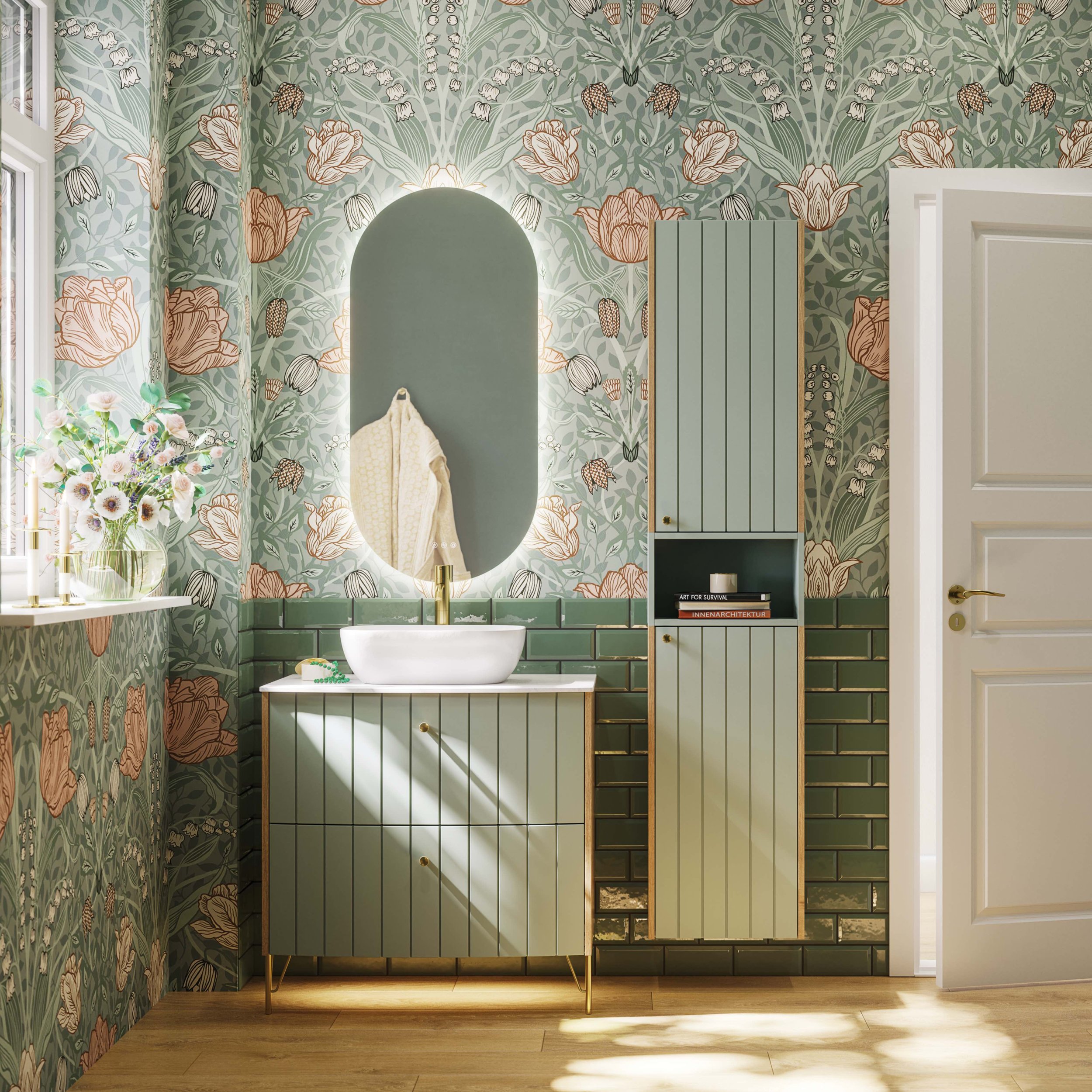 Green grooved bathroom vanity unit agains floral wallpaper