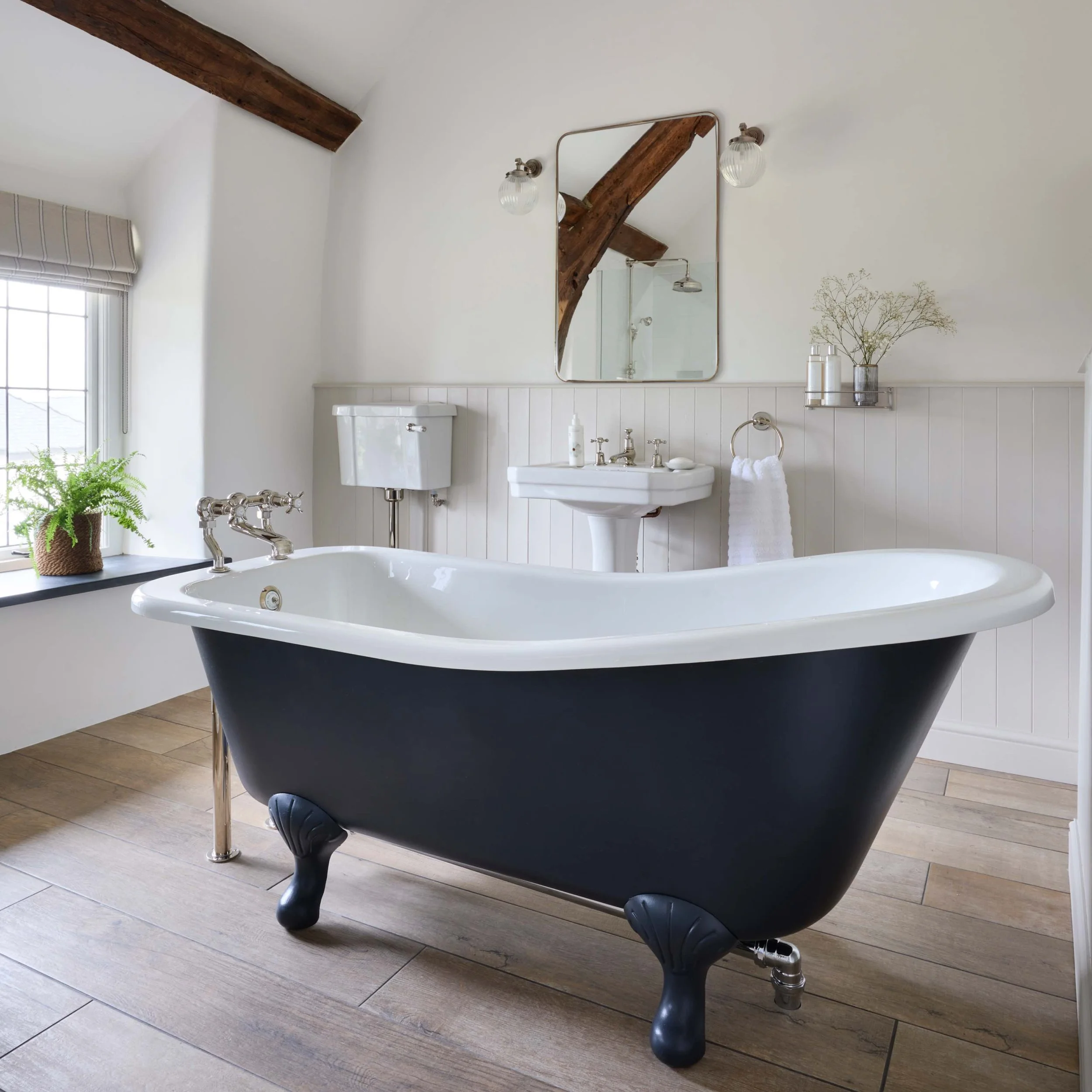 blue slipper bath in old country bathroom