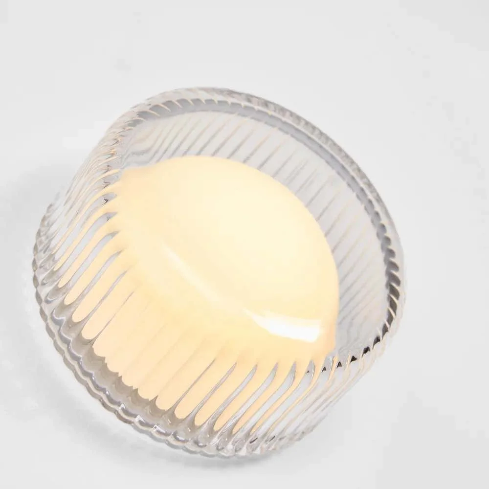 small round ribbed bathroom light - not on