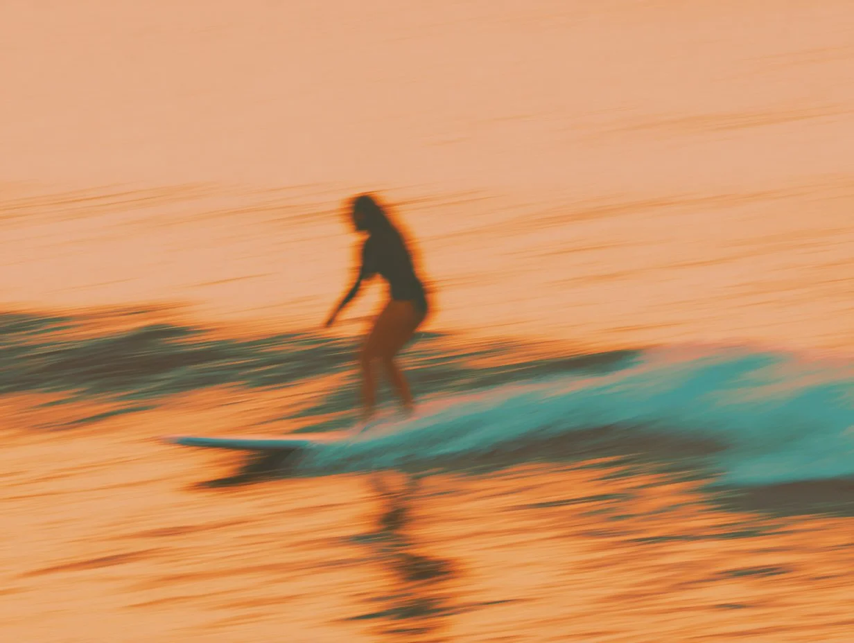 u6452738645_A_blurry_retro_photograph_of_a_girl_surfer_on_a_l_4aaa24f4-c804-4e60-847b-996eebb88043_2.jpg