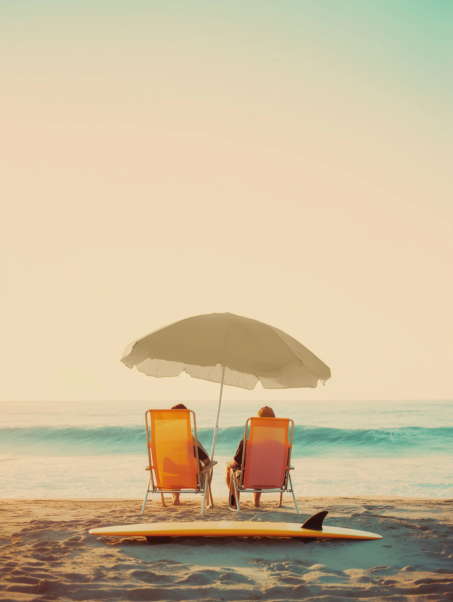 u6452738645_a_photograph_of_two_people_sitting_on_orange_beac_47781689-79b1-40b0-87e9-96477666aae0_0.jpg