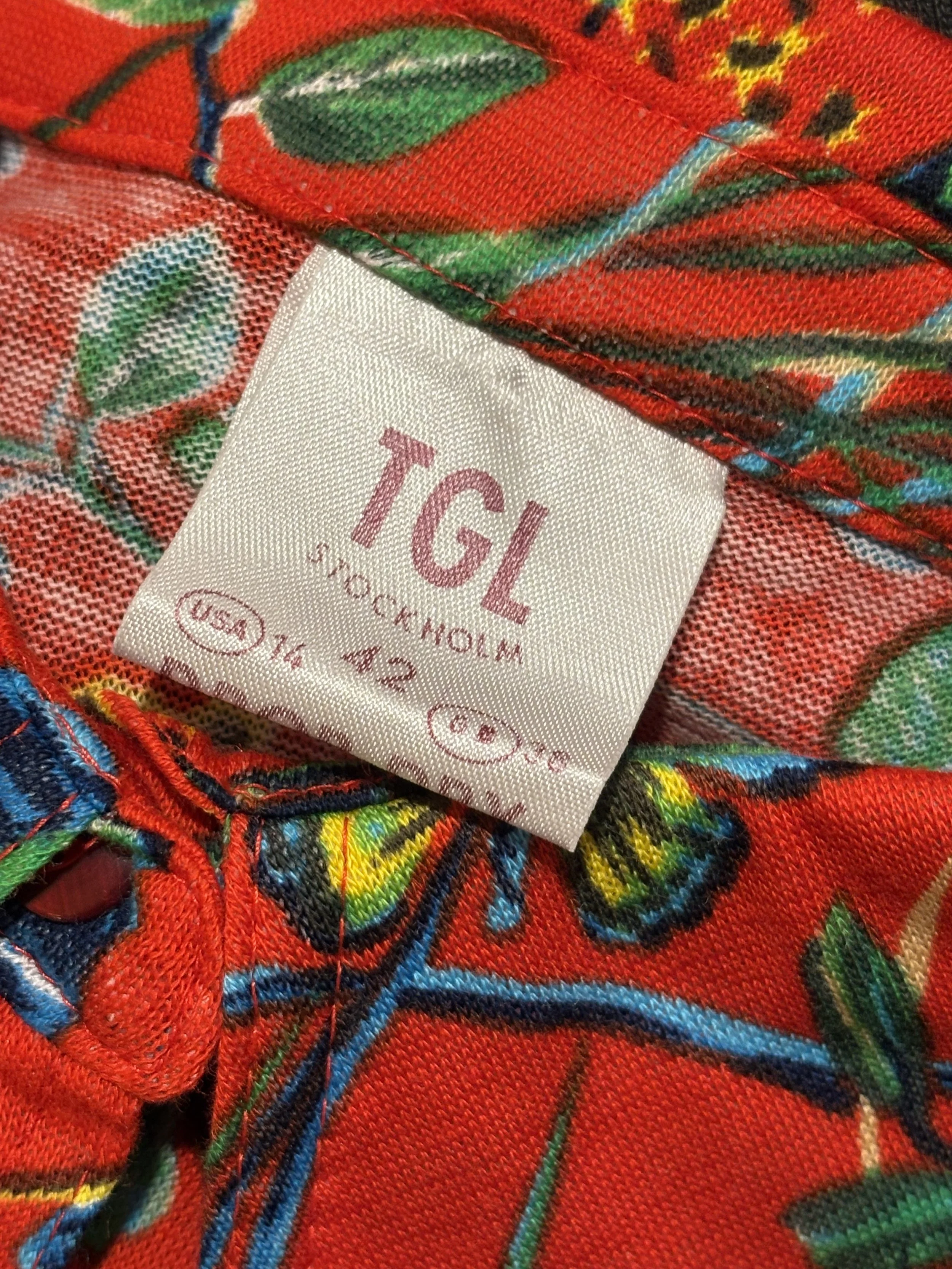Camisa polera vintage de los años 70 TGL Stockholm made in sweden nueva a estrenar mariposas