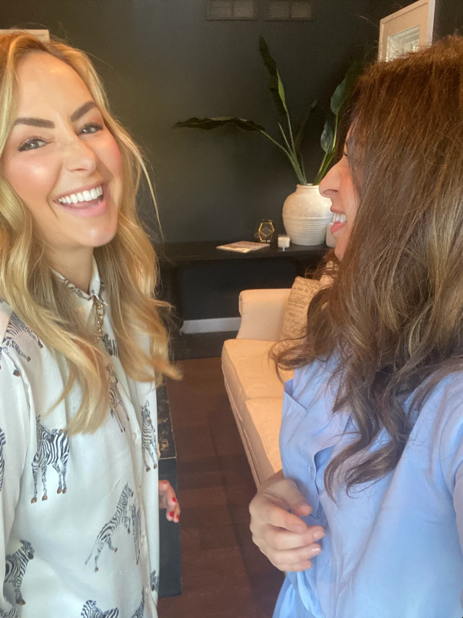 The cohosts of the #1 divorce podcast, How Not to Suck at Divorce between recordings.