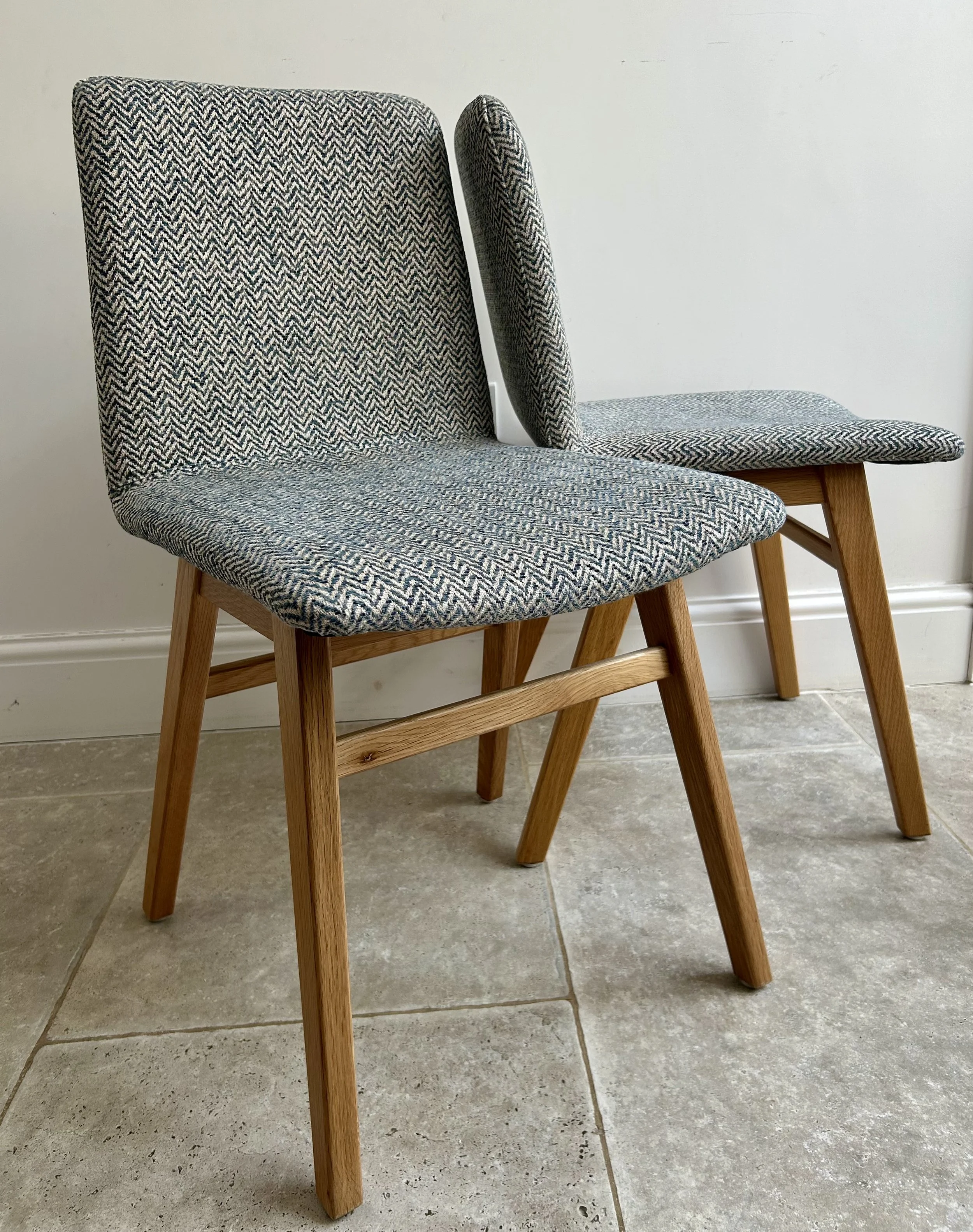 2 of a set of 8 dining chairs reupholstered in gorgeous Linwood herringbone wool