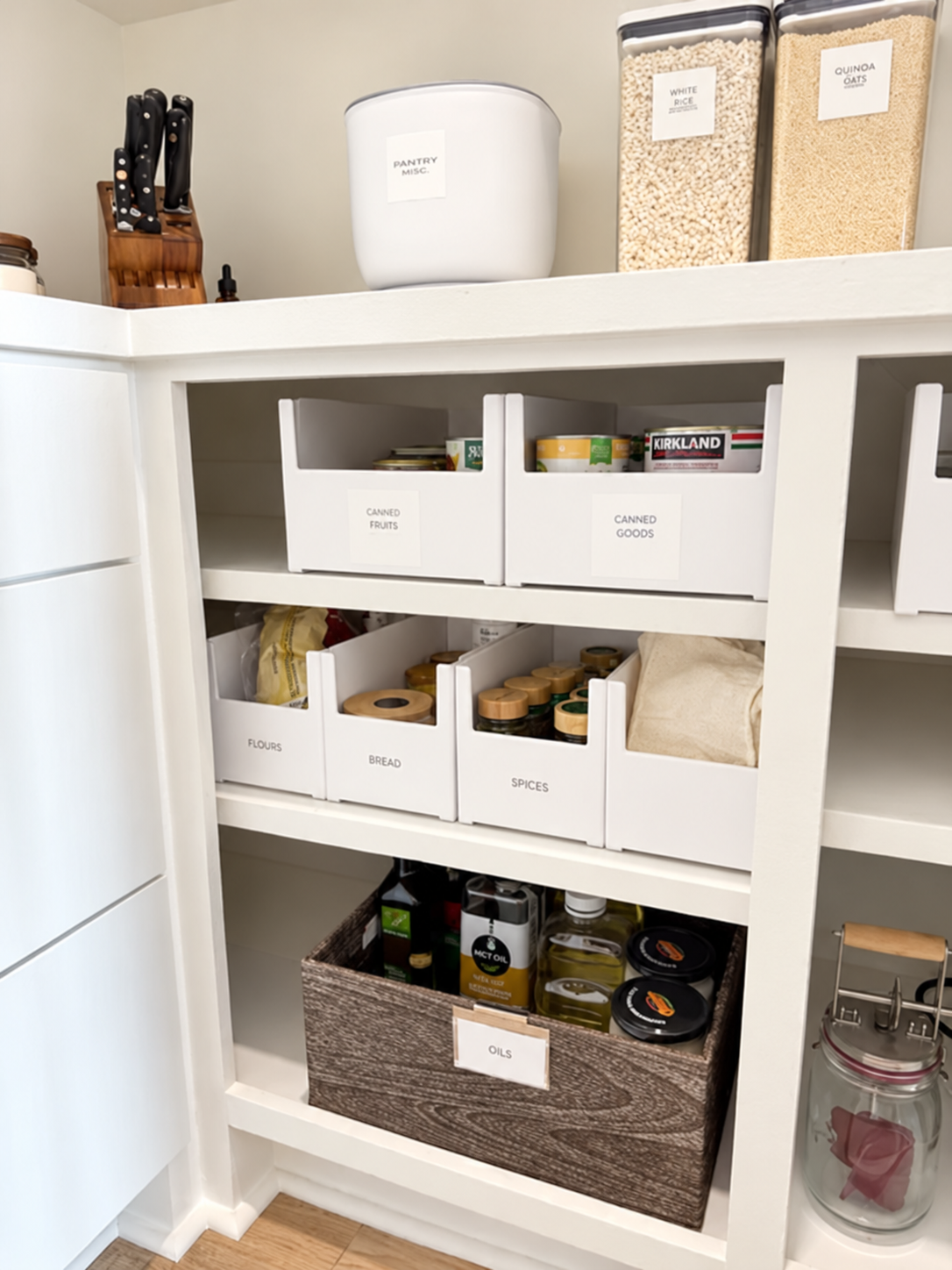 Organized open cabinets in the Heights, Houston