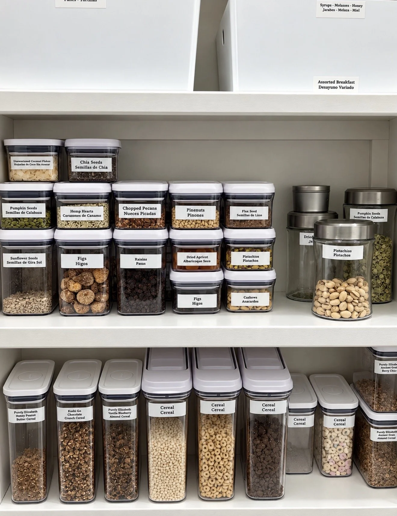 OXO Pop containers with snacks and cooking ingredients in a Bellaire, Texas pantry.