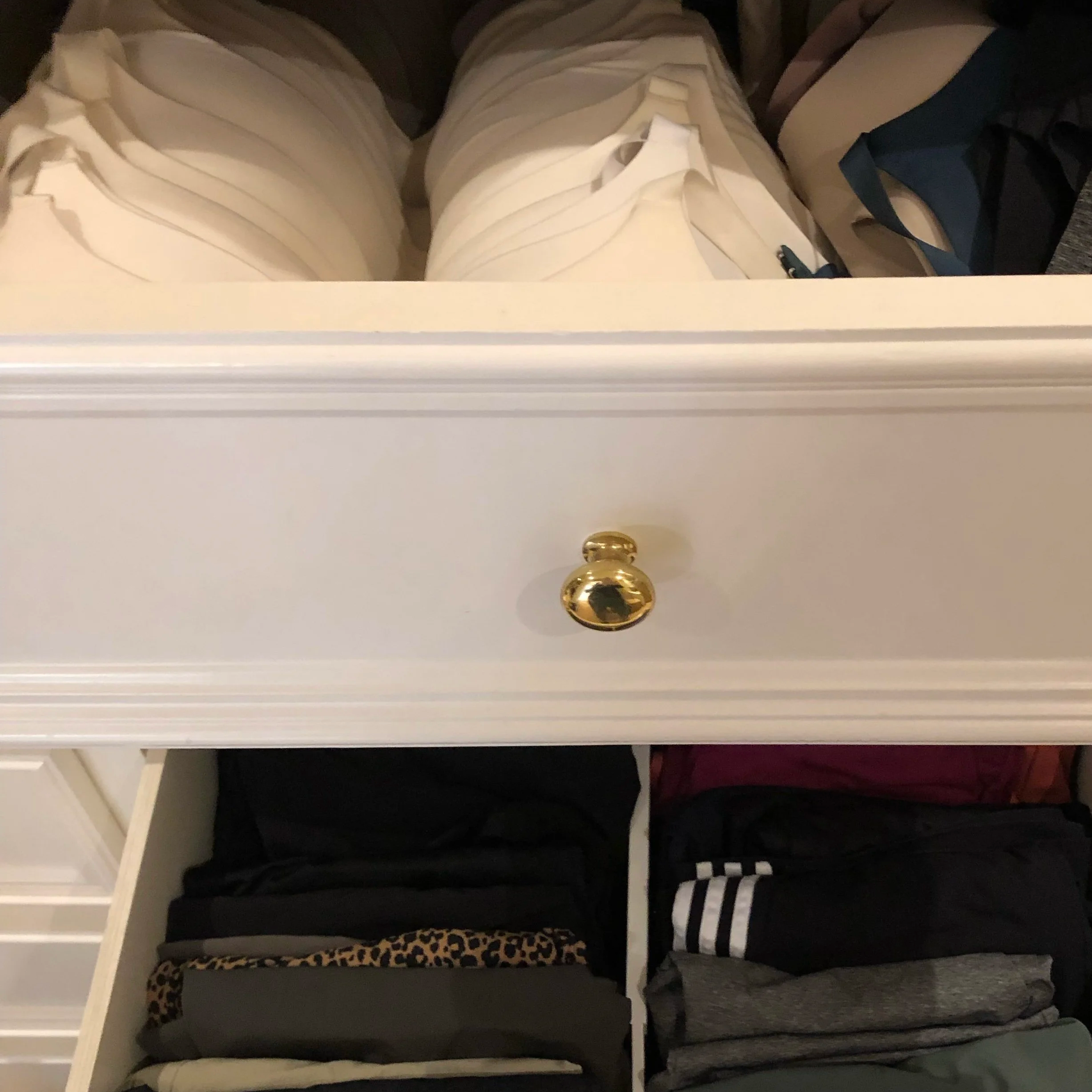 Bras and undergarments neatly arranged in a drawer by Luxury Pro Organizer.