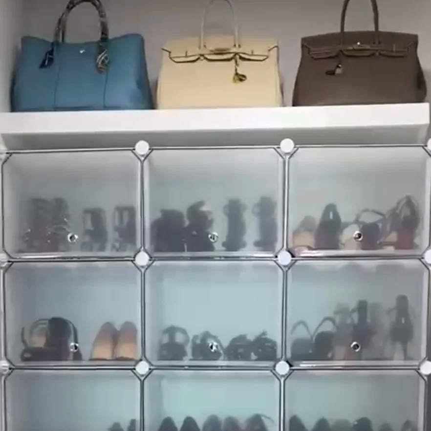 Luxury handbags and shoes organized in a Tanglewood Houston primary closet