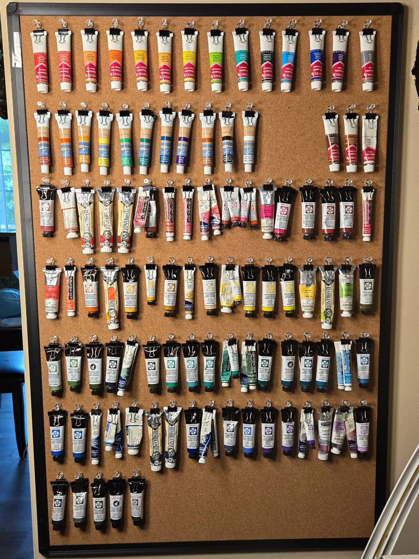 Finally got around to organizing my gouache and watercolors. I ran out of thumb tacks, though, oops.

Well over 100 paints, with maybe 20 to go. I've always been a @danielsmithartistsmaterials watercolor gal, but I've inherited my late mother in law'