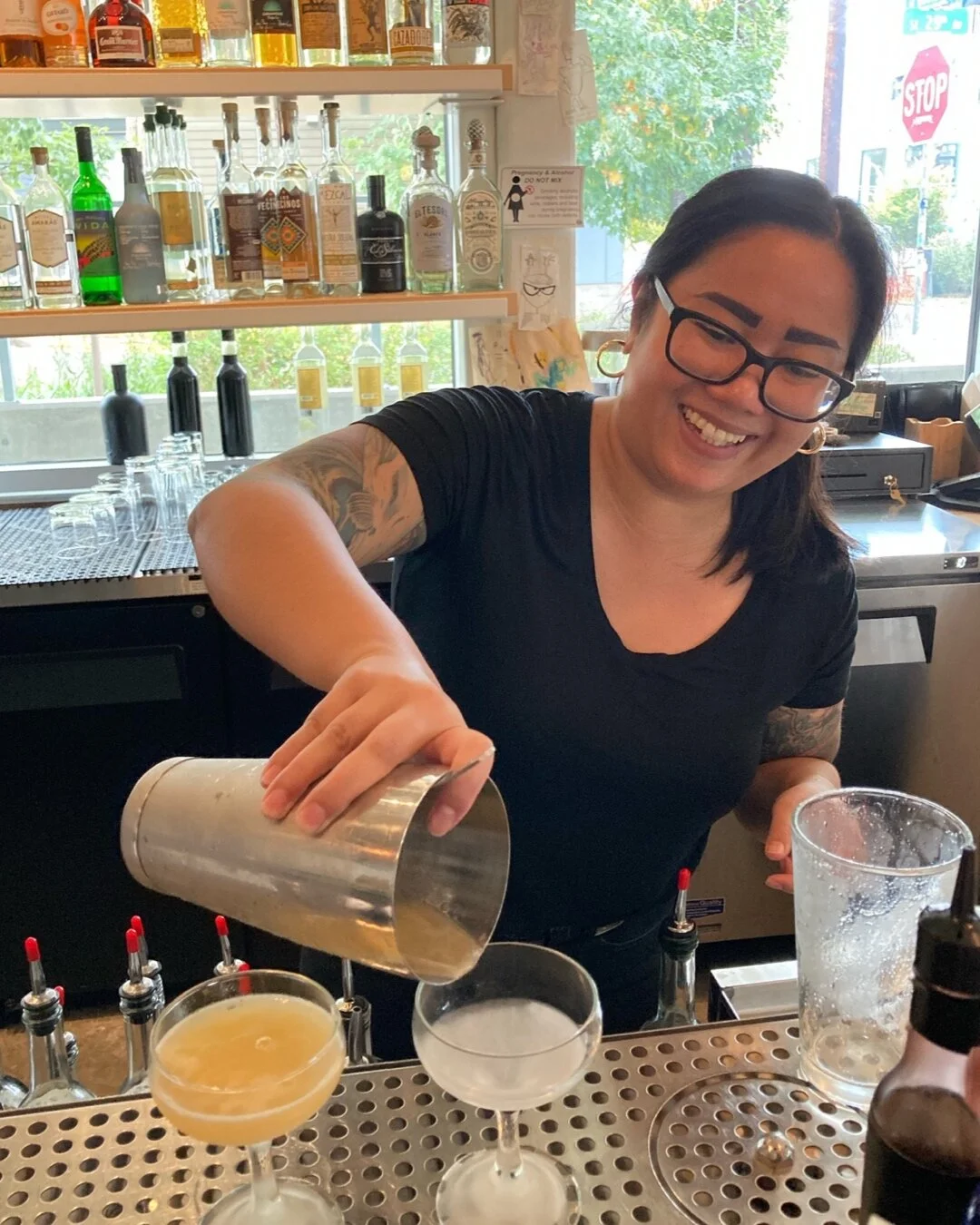 Nori mixing up some pre dinner cocktails for our guests.