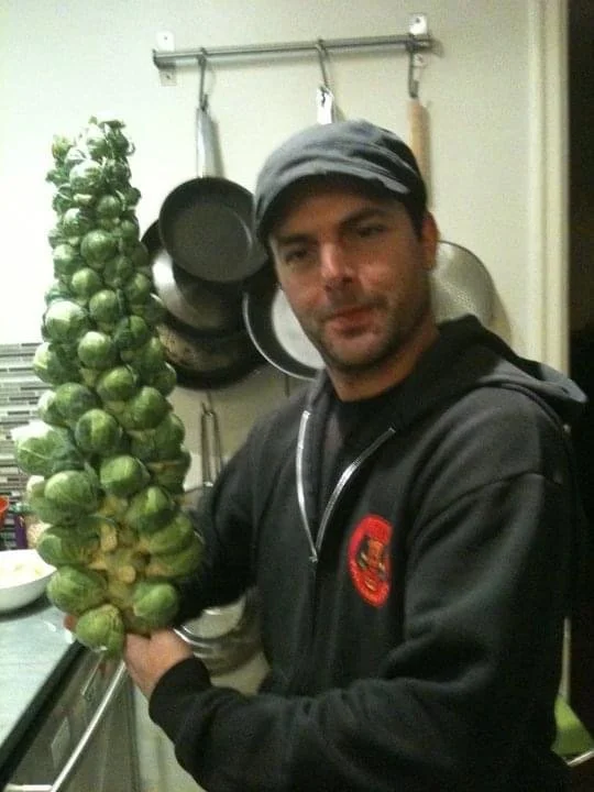 Brandon and a Brussel Sprout Tree
