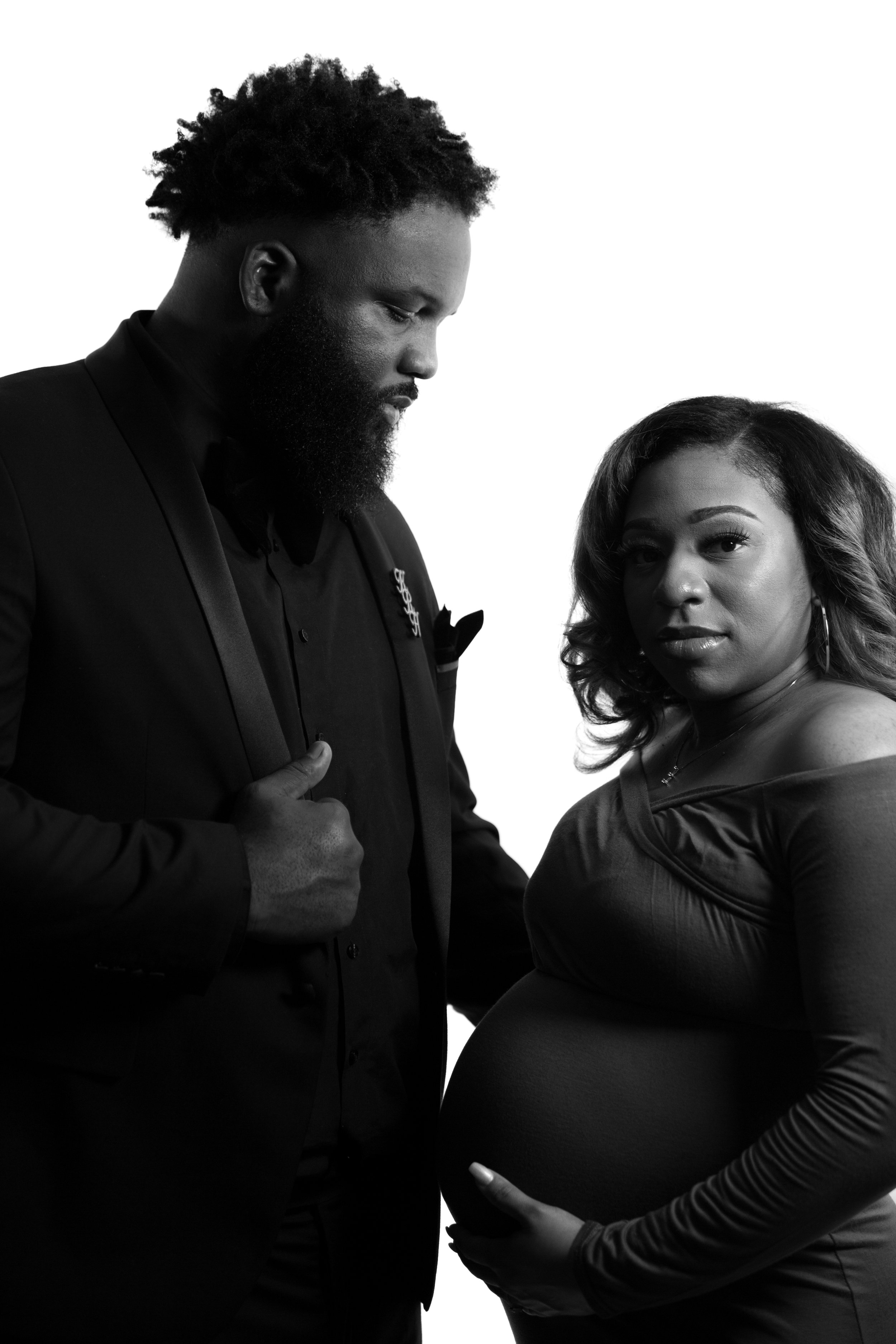 First-time parents-to-be King'Roy and Ashley embrace.