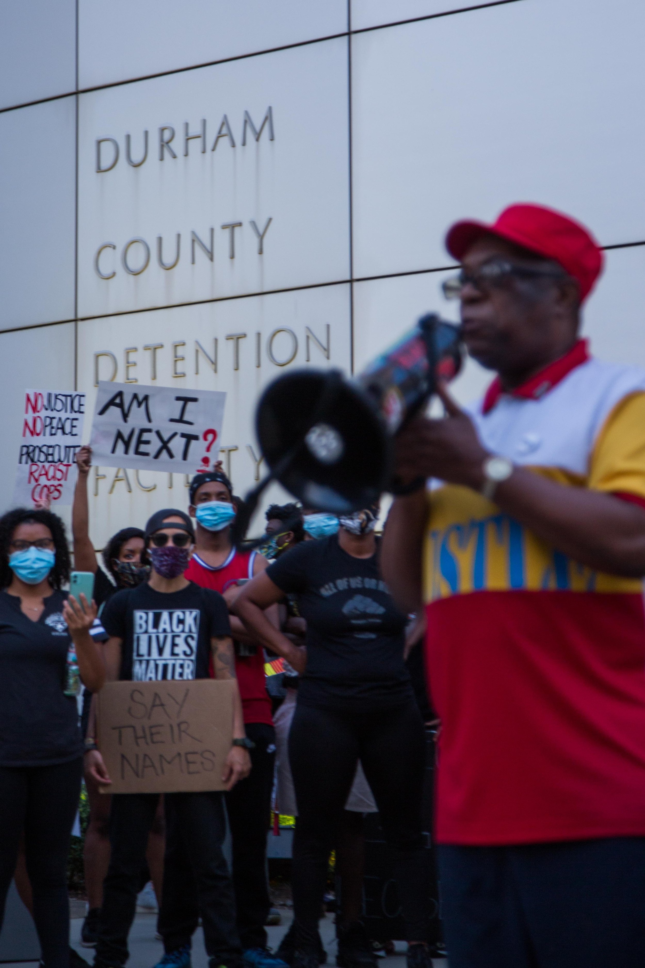 Citizens demonstrate to defund the police outside the Durham County Detention Facility in Durham, North Carolina.