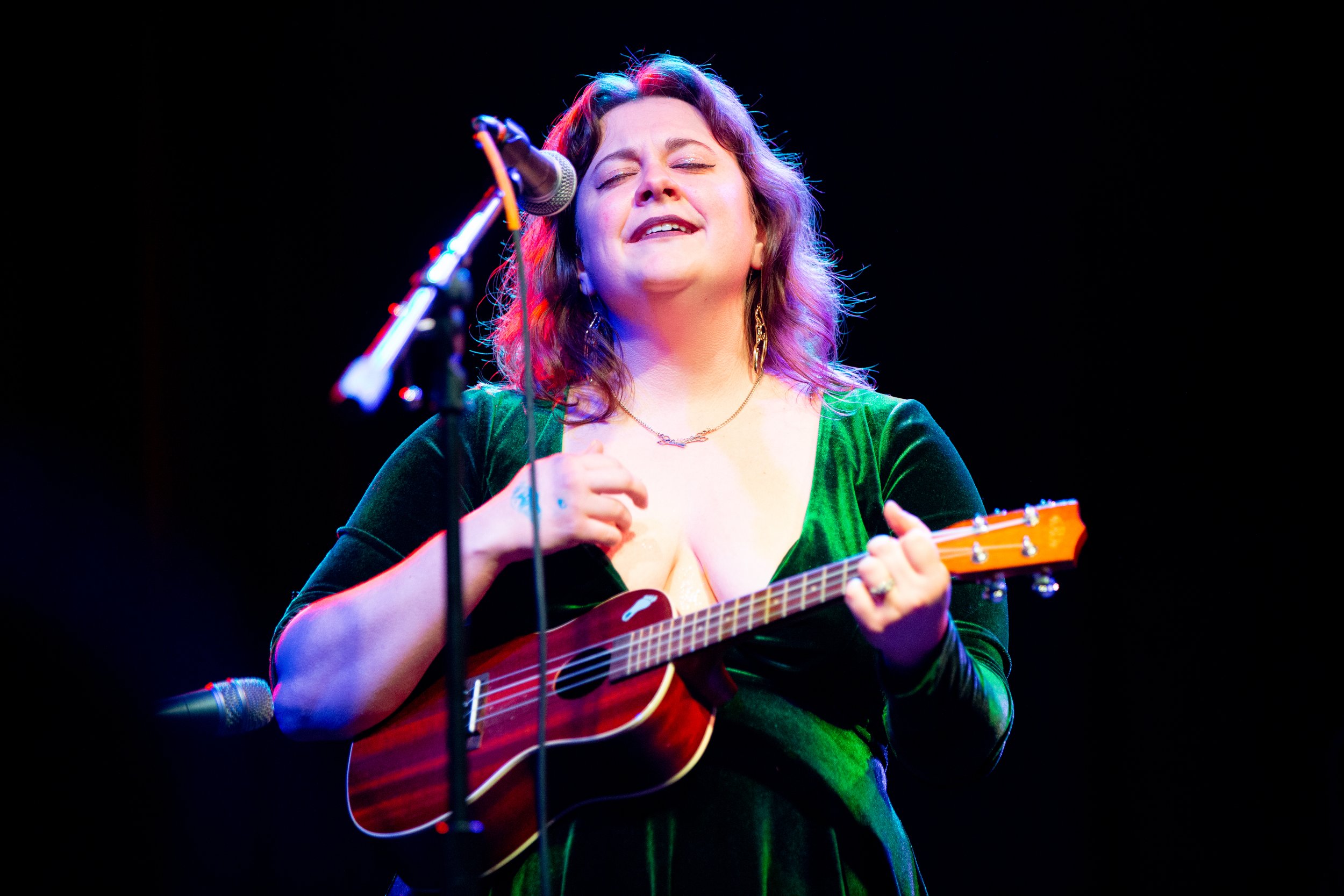 Anna plucks her ukulele at a cabaret performance hosted by the Common Woman Chorus in Durham, North Carolina.
