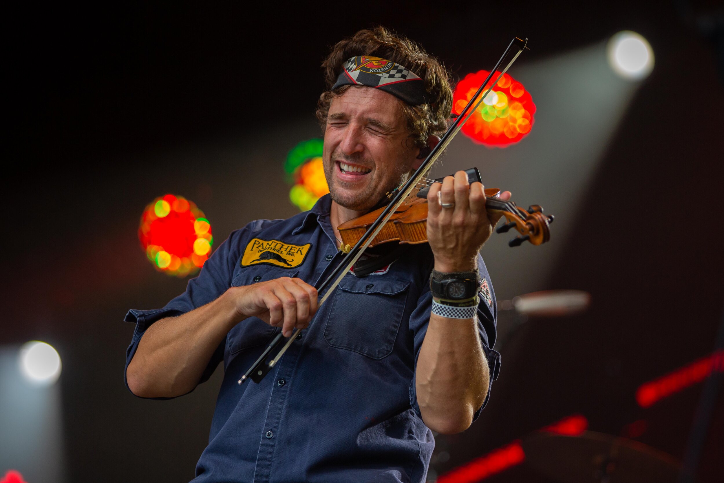 Alexander Fedoryka, band member of Scythian, plays the fiddle at Merlefest in Wilkesboro, North Carolina.
