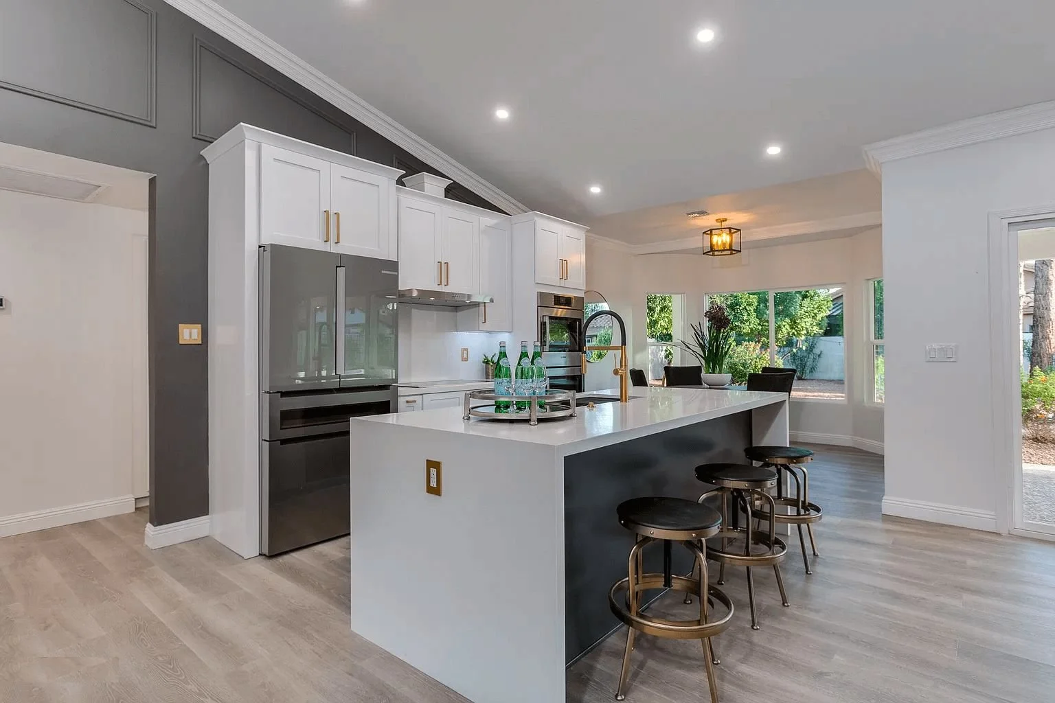 white and dark contrasting cabinets kitchen