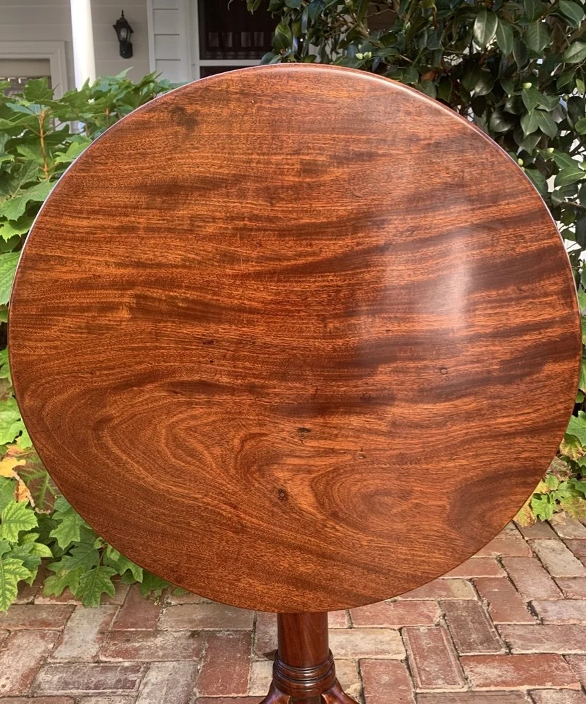 George III mahogany wine table, tilted circular top showing close up of single-plank figure, English antique c.1770-1790