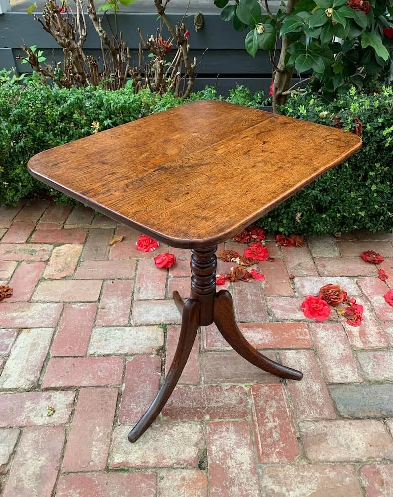 Georgian oak tilt-top lamp table C.1800-1820, angled view showing rich patina and grain
