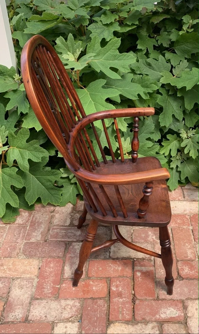 profile view of yew wood and elm windsor chair c.1840