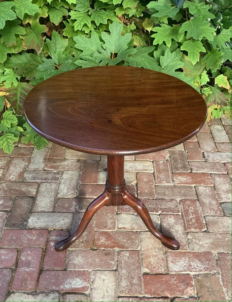 George III mahogany tilt-top wine table, circular top, turned column, swept tripod base with cabriole legs with pad feet, circa 1770-1790