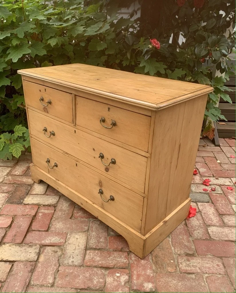 Early 19th century pine chest of drawers side profile showing moulded top edge