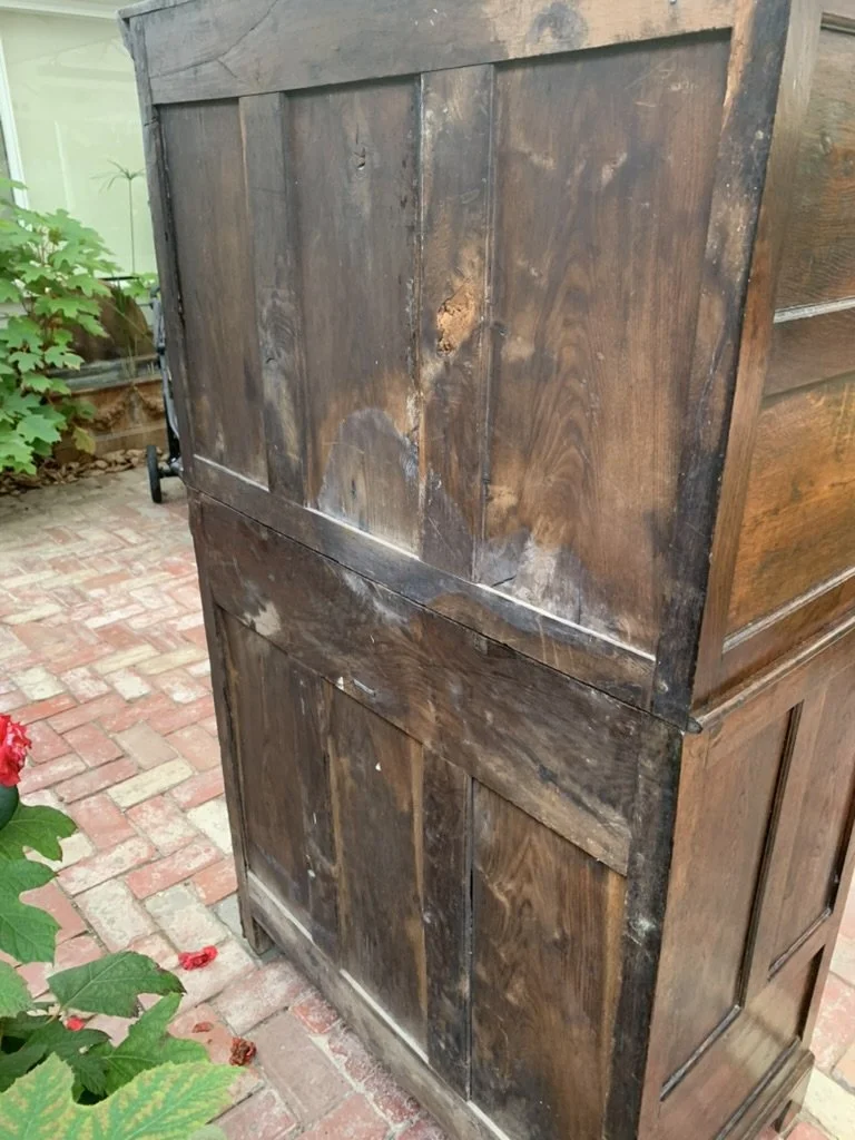 Reverse view of 18th century Welsh oak cwpwrdd deuddarn showing plank construction and natural aged patina