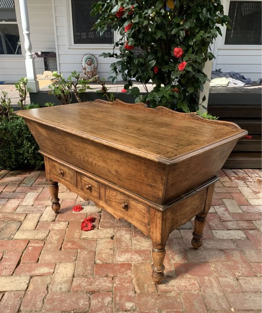 French cherrywood dough bin on stand, c.1840, shaped gallery back and three-drawer base