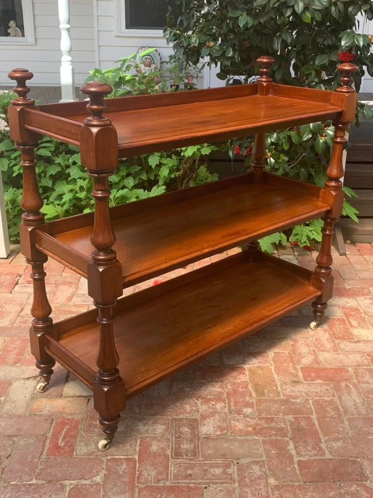 Antique Australian Colonial cedar dumb waiter C.1870, three-tier Victorian serving stand with original porcelain castors