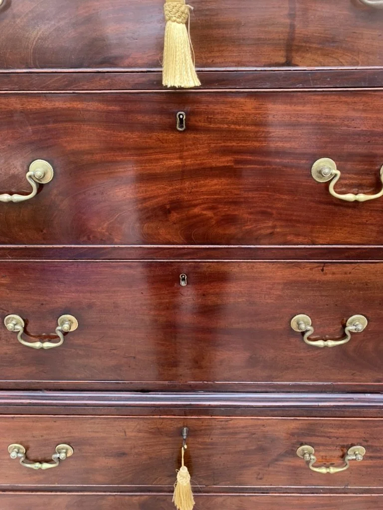 Figured mahogany drawer fronts, original brass handles, C.1780 tallboy