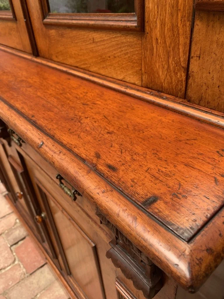 close up of thumbnail moulding to base section of Australian Colonial cedar bookcase