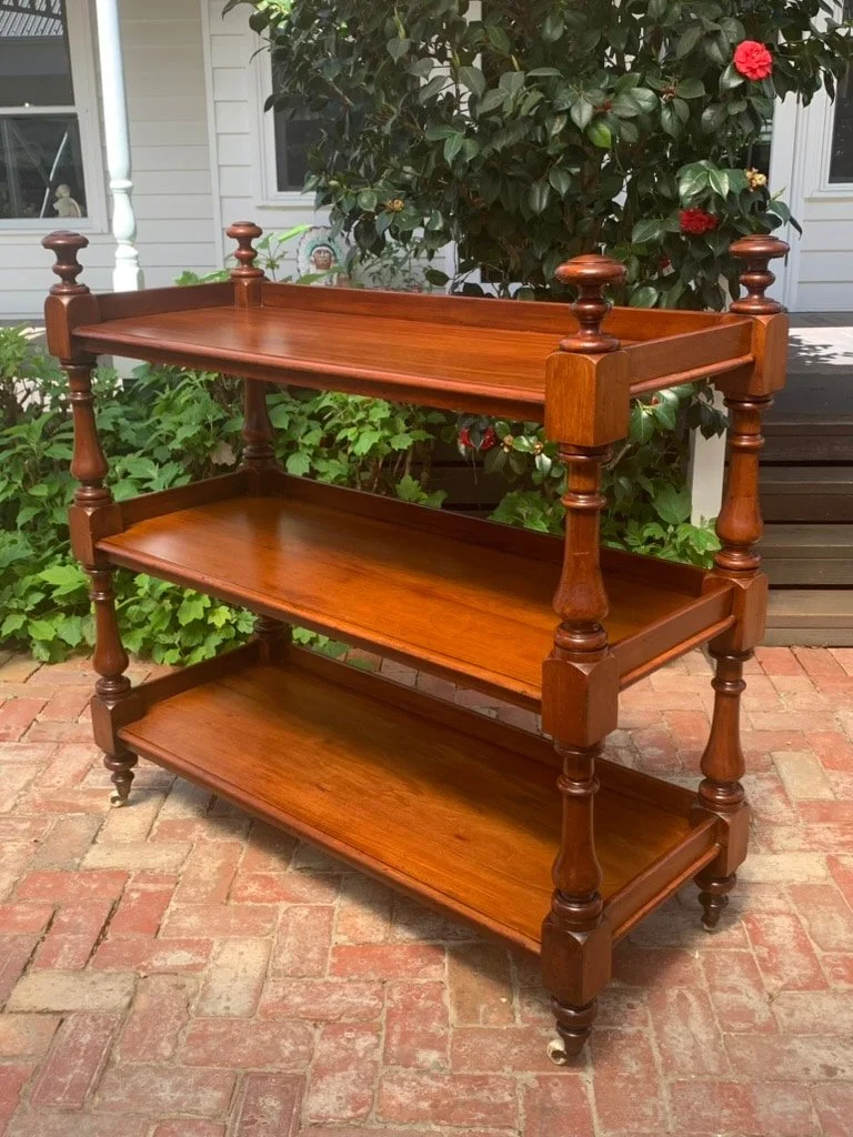 Victorian Australian red cedar three-tier dumb waiter C.1870, turned baluster uprights, galleried shelves, Colonial buffet