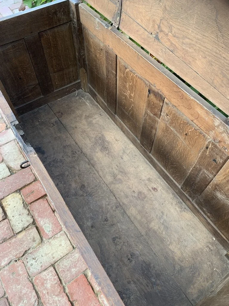 17th-century oak coffer interior floor boards back panel detail aged surface wear c.1660 English vernacular